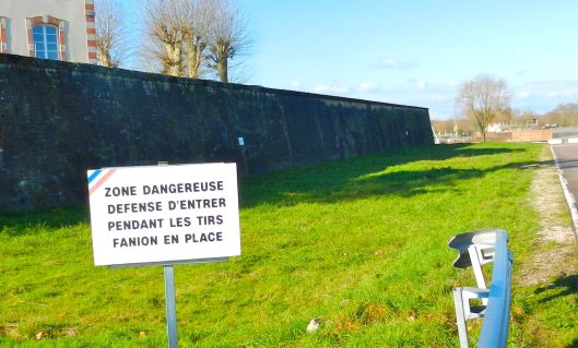 Don't enter when the firing starts. Wewalk by this mysterious sign, adjacent to the army barracks every day.