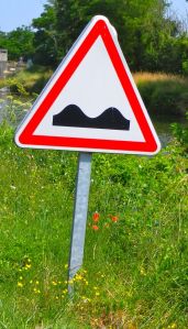 This really warns of speed bumps, what our English friends call "sleeping policemen."