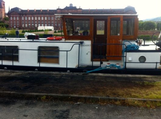 The black area outside the barge door is where angry Algerian fans burned a car - but not a German car - after Germany beat Algeria in the World Cup the night before we arrived at Saverne.