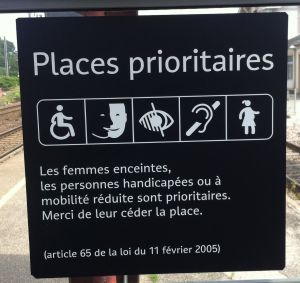 The mysteries of French signage continued. This sign at an Alsatian train station, described reserved sitting places for people with disabilities. We figured out the handicapped person, the blind person, the deaf person and the pregnant person. But thge second symbol from the left puzzled us. Could they really be reserving a bench for multiracial people?